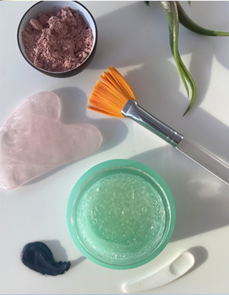 Skin Care image of various salves and balms with a brush applicator